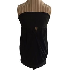 Black Magic awesome top purchased a Miami boutique never worn size XL